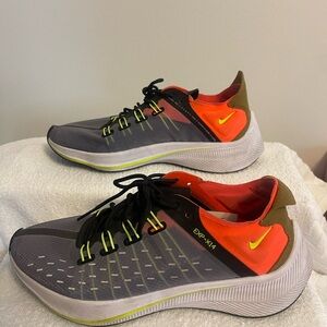 Nike Running shoes comfortable and supportive. Barely worn perfect condition!